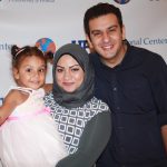 Rasha Elhesha with her husband and daughter
