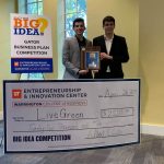 Pablo Garces and Brian De Souza with their first place $25,000 check at the Big Idea Competition.