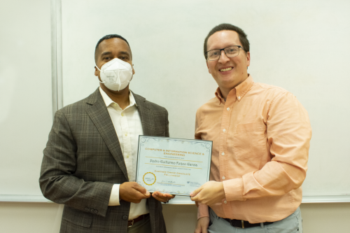 Juan E. Gilbert, Ph.D., CISE department chair, with Pedro Guillermo Feijoo Garcia, a recipient of the Gartner Group Graduate Fellowship.