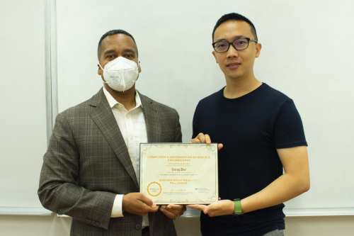 Juan E. Gilbert, Ph.D., CISE department chair, with Yang Bai, a recipient of the Gartner Group Graduate Fellowship.