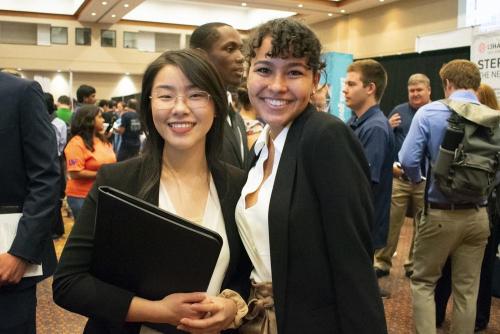 Two students attending the Fall 2019 CISE Career Fair.